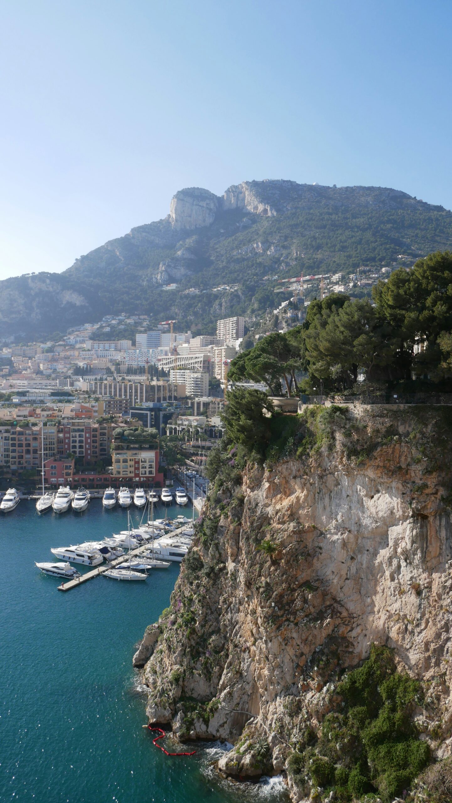 Monaco harbour with yachts and cliffs